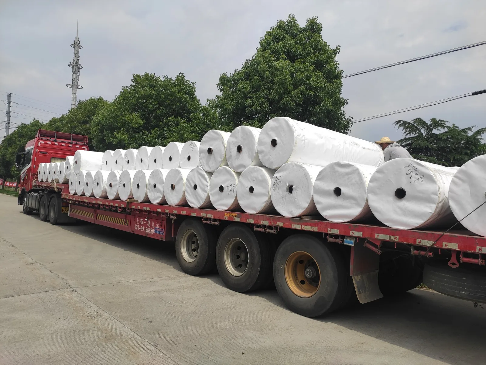 Truck loaded with PE woven fabric rolls prepared for bulk dispatch